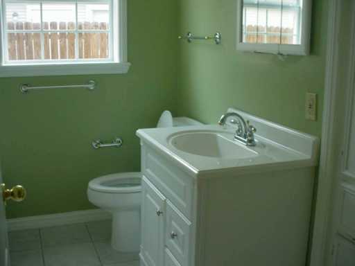 449 Southern Street Corpus Christi, TX 78404 - Photo 8 of 10 a bathroom with a sink and a toilet