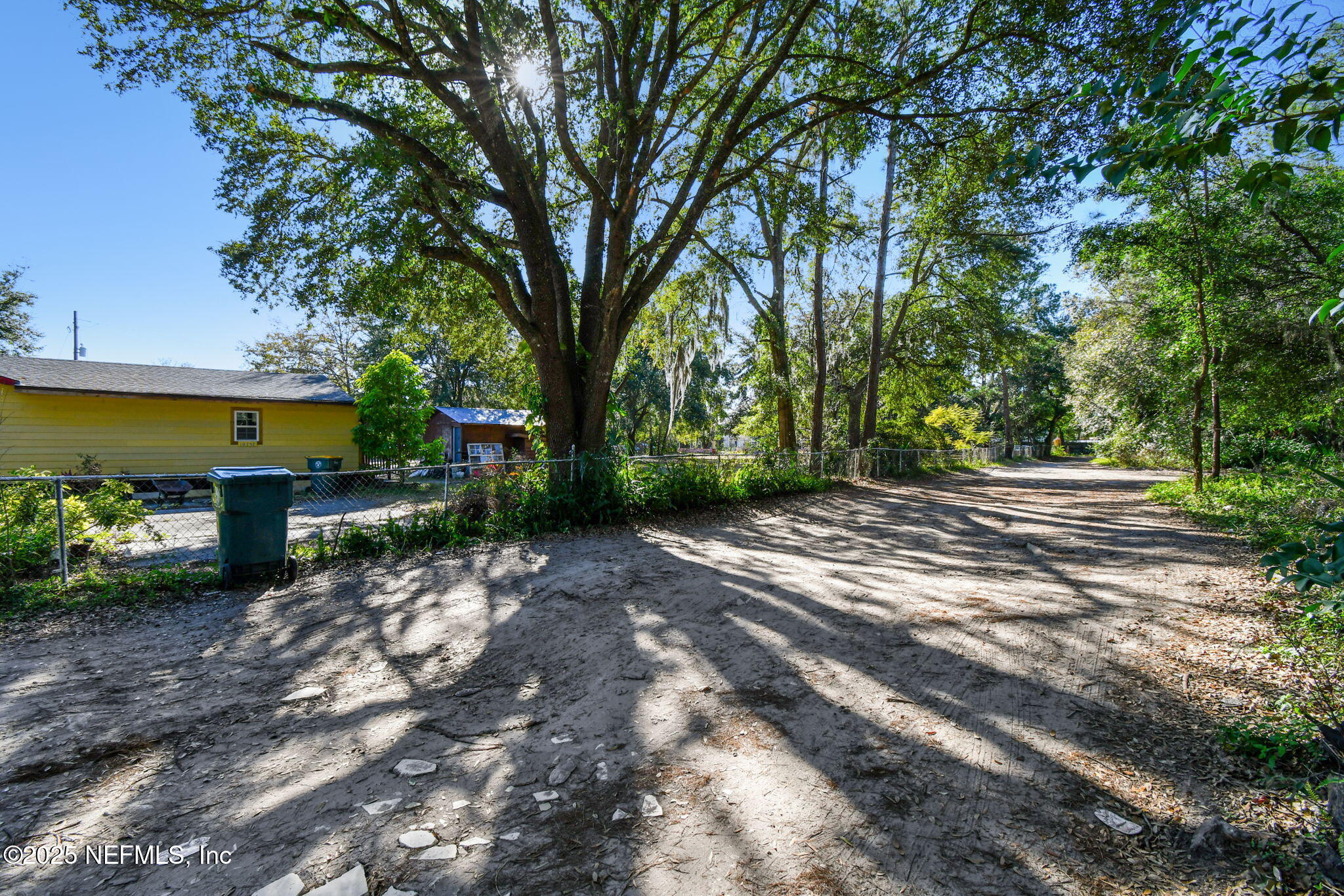 0 McLaurin Road Jacksonville, FL 32256 - Photo 4 of 4 a view of a backyard with large trees