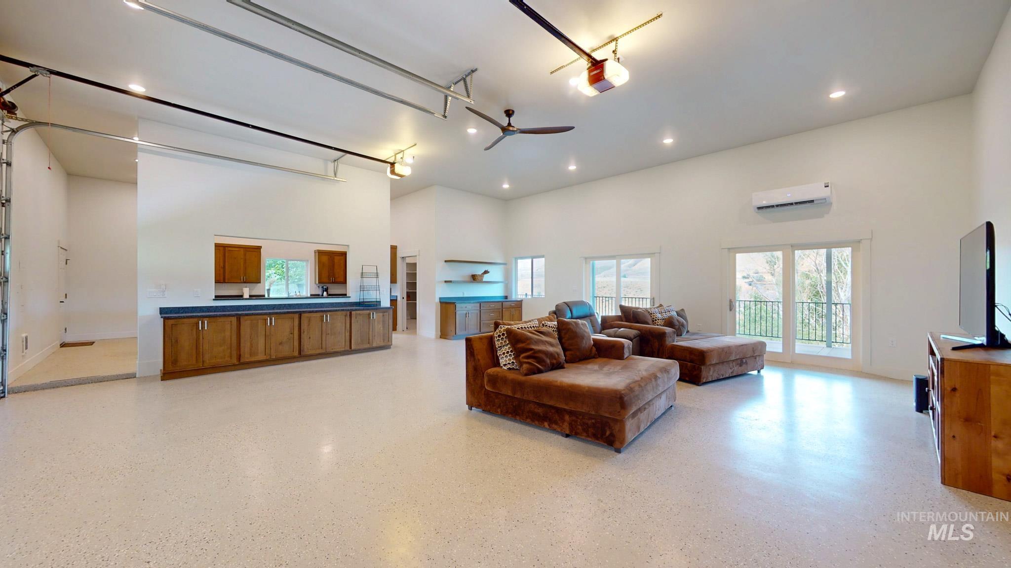 863 Pottery Road Bliss, ID 83314 - Photo 23 of 45 Spacious room featuring high ceilings, recessed lighting, and light-toned flooring