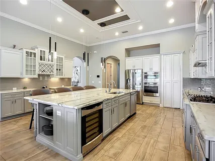 a view of kitchen with furniture and window