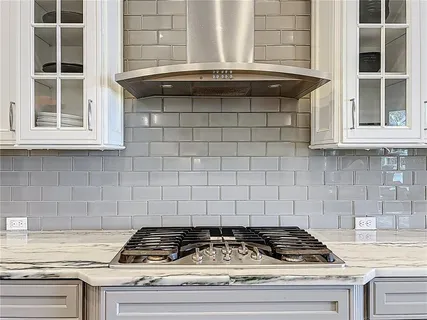 a open kitchen with a large window