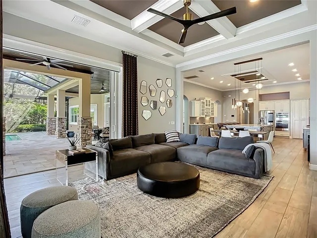 a bathroom with a granite countertop tub a sink and a window