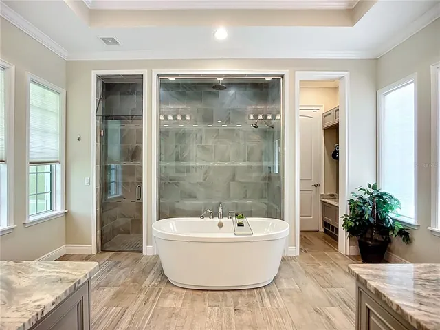 a utility room with sink dryer and washer