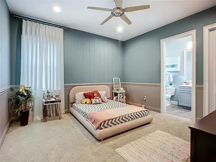 an aerial view of a house with a yard lake lake view and mountain view