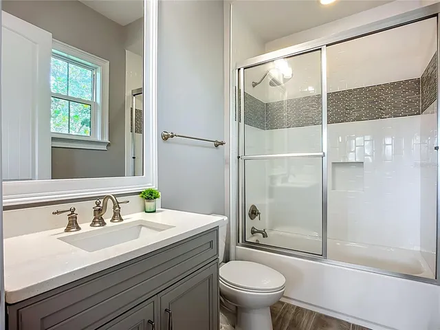 a view of a lake with a yard