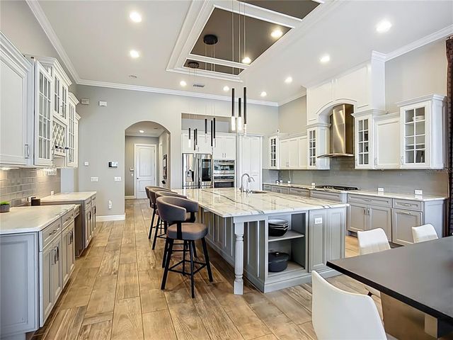 a view of a swimming pool with a yard