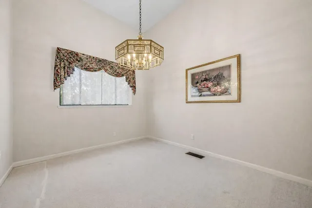 a bathroom with a double vanity sink toilet and shower