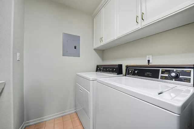 a view of a table and chairs in the garden