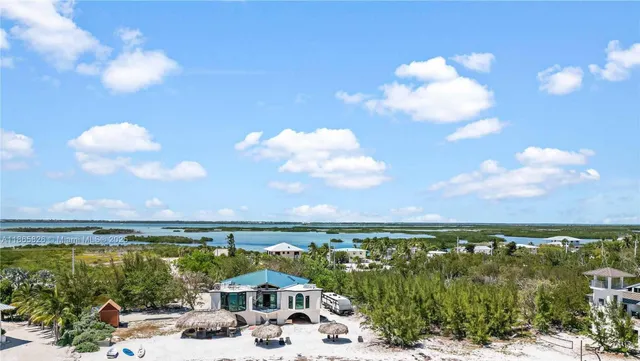 a terrace with outdoor seating and green space