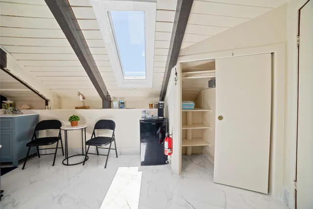 a view of a house with snow on the wall