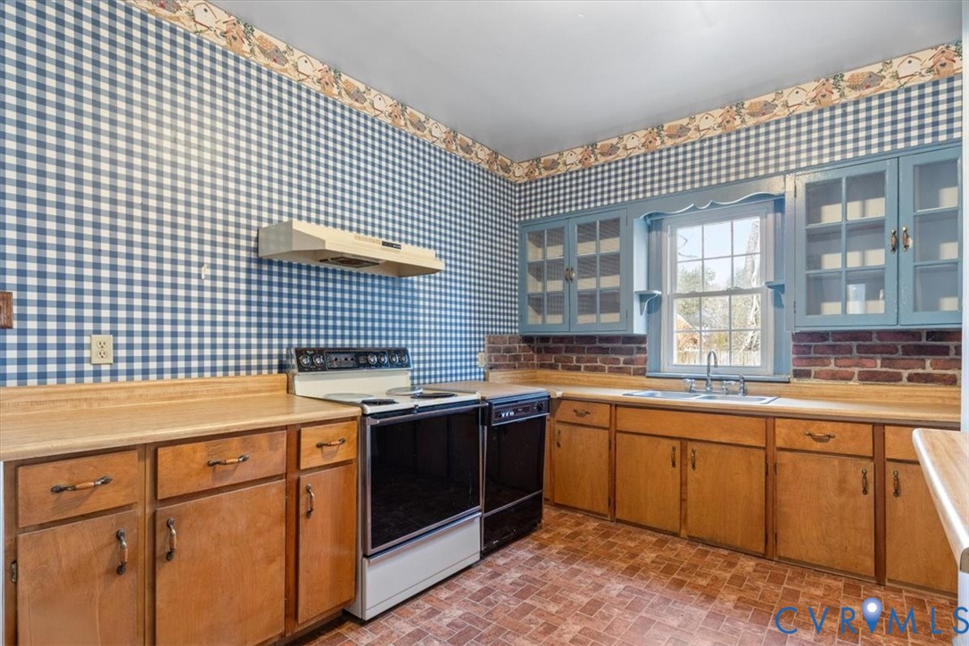 11221 Hanover Courthouse Road Hanover, VA 23069 - Photo 12 of 31 a kitchen with a sink and cabinets