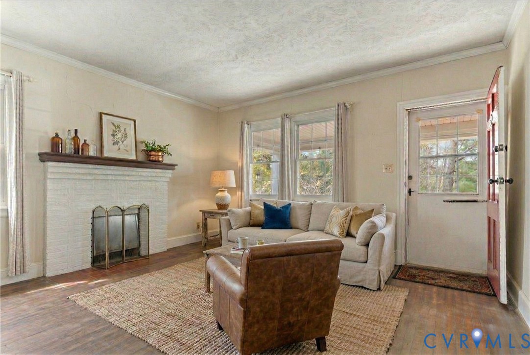 11221 Hanover Courthouse Road Hanover, VA 23069 - Photo 2 of 31 a living room with furniture and a fireplace