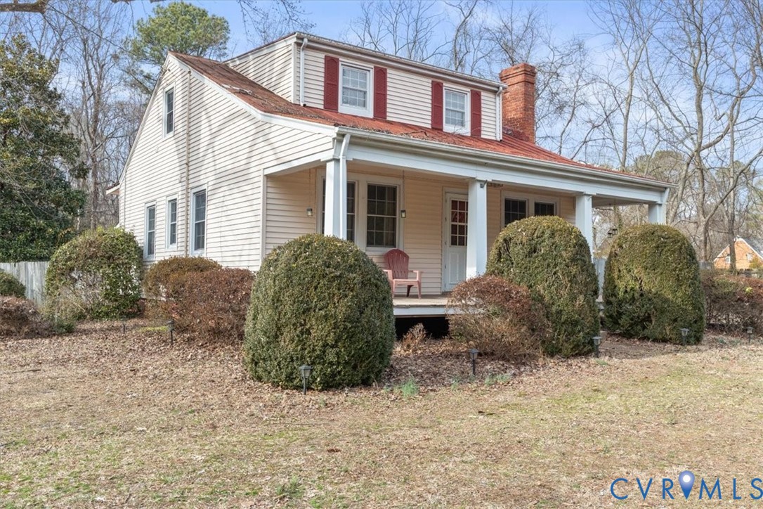11221 Hanover Courthouse Road Hanover, VA 23069 - Photo 29 of 31 a view of a house with a yard and plants