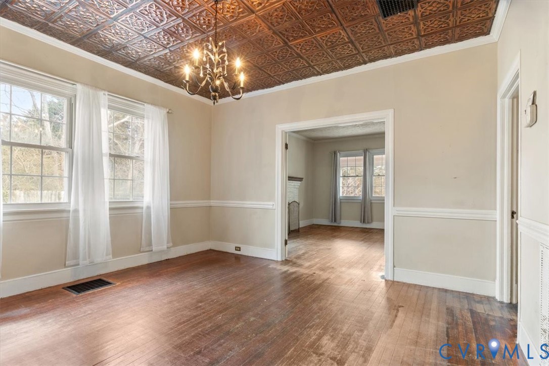 11221 Hanover Courthouse Road Hanover, VA 23069 - Photo 10 of 31 an empty room with wooden floor and windows