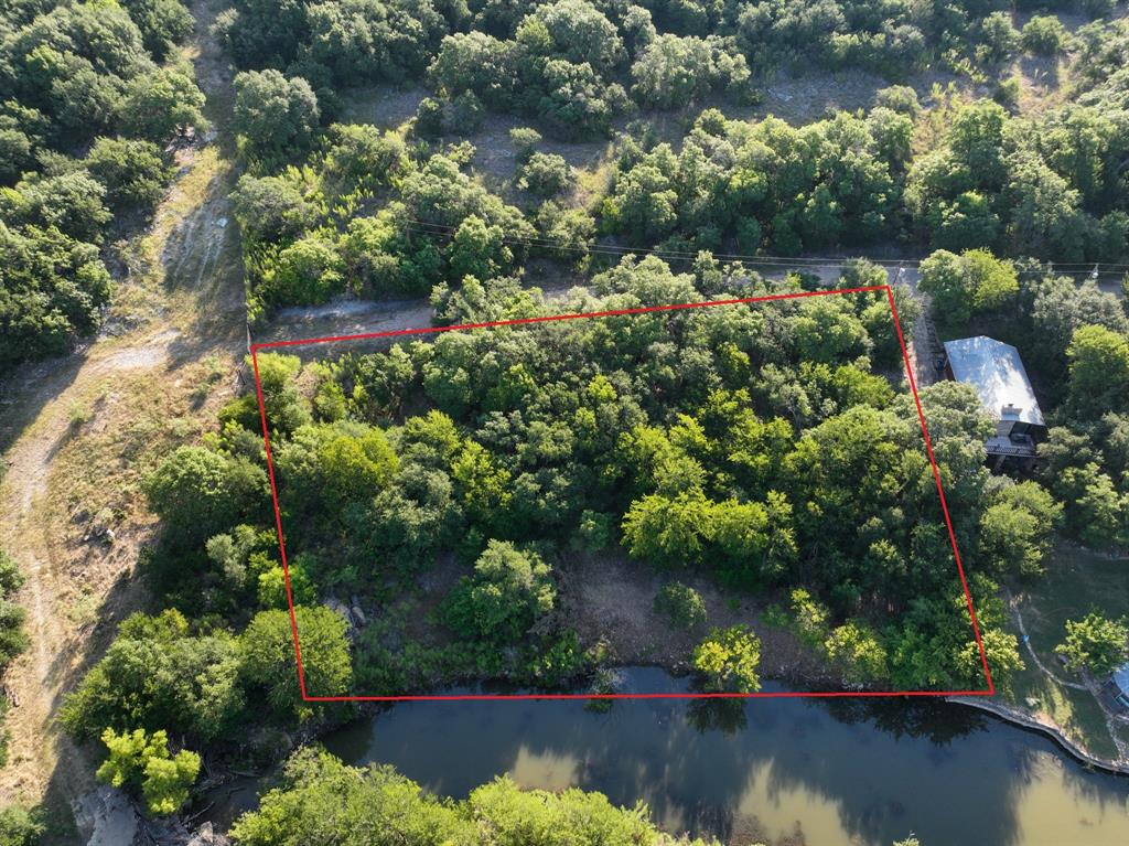 707 Trail End Clyde, TX 79510 - Photo 14 of 16 an aerial view of a house with yard swimming pool and outdoor seating