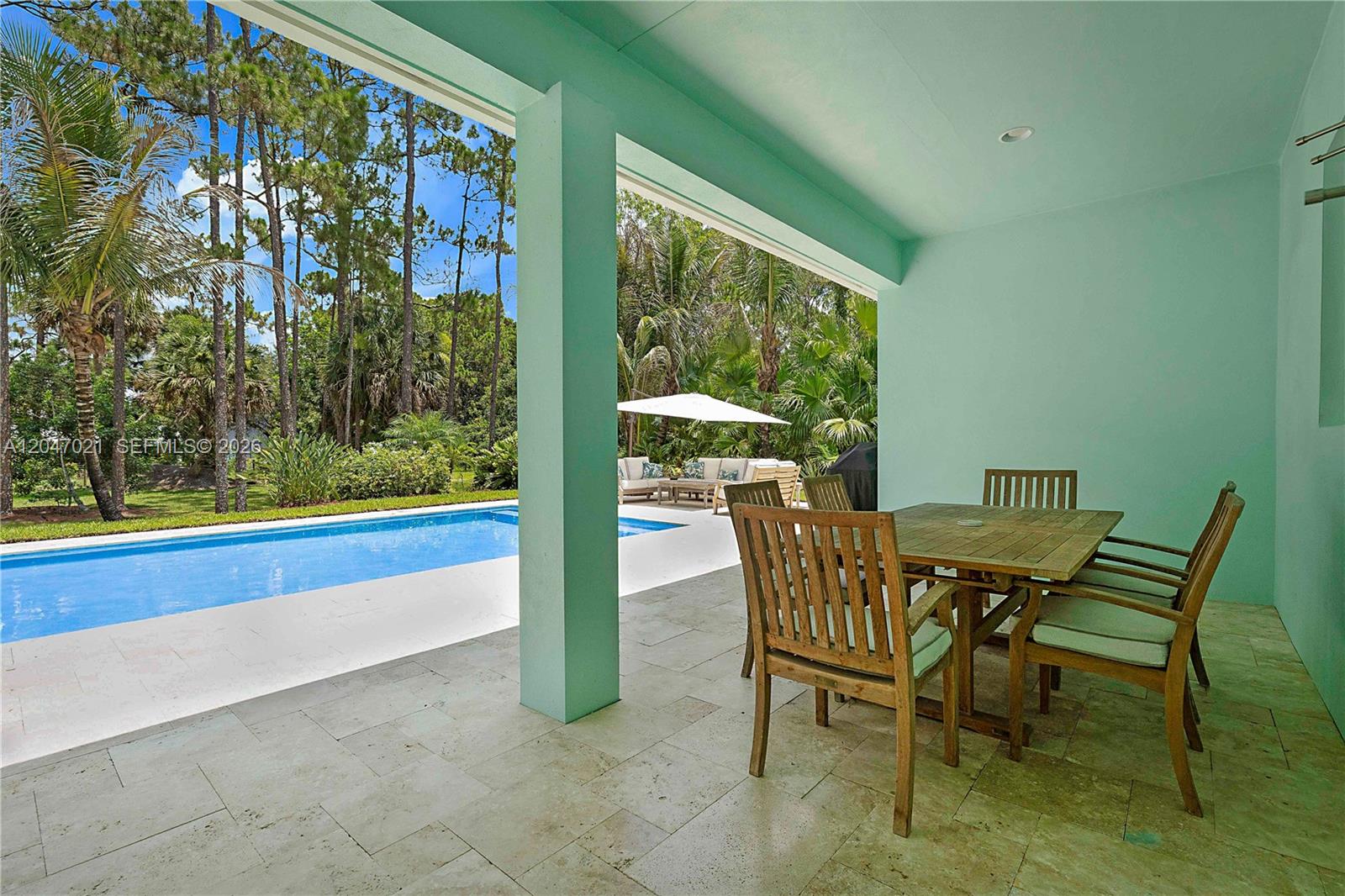 12127 154th Road North Jupiter, FL 33478 - Photo 41 of 67 Covered Patio and Dining area