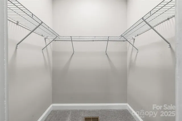 a view of a room with racks on the wall