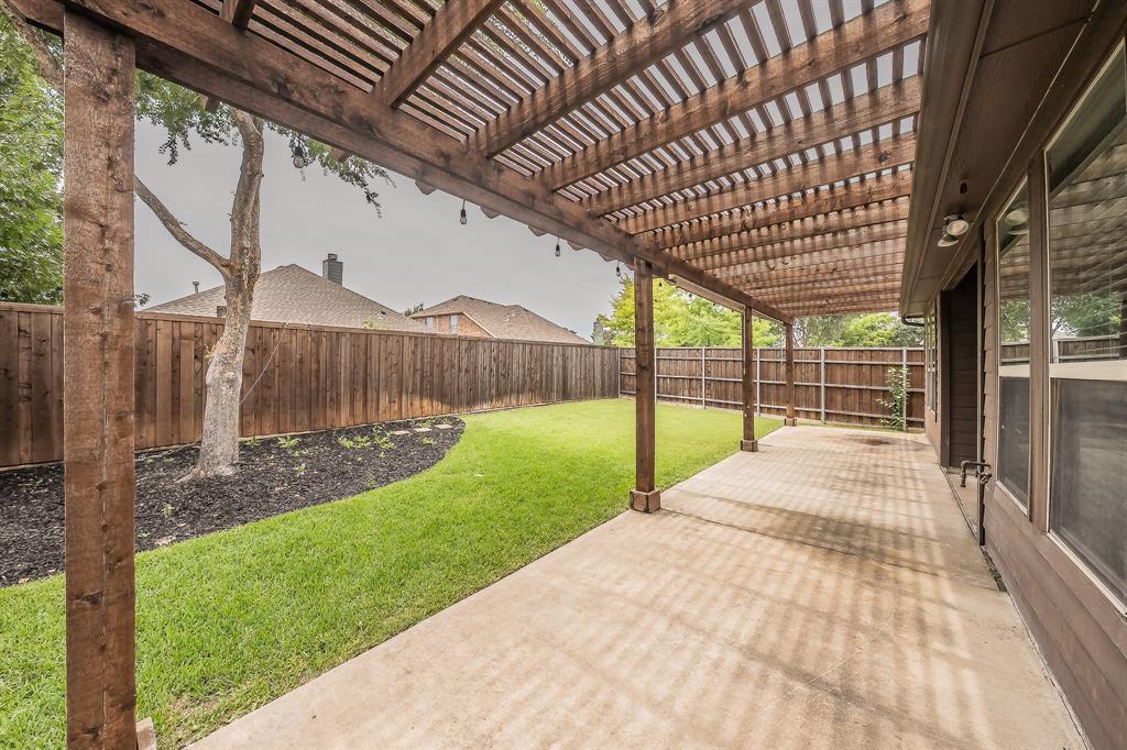 412 Hideaway Road McKinney, TX 75072 - Photo 40 of 40 a view of backyard with seating space