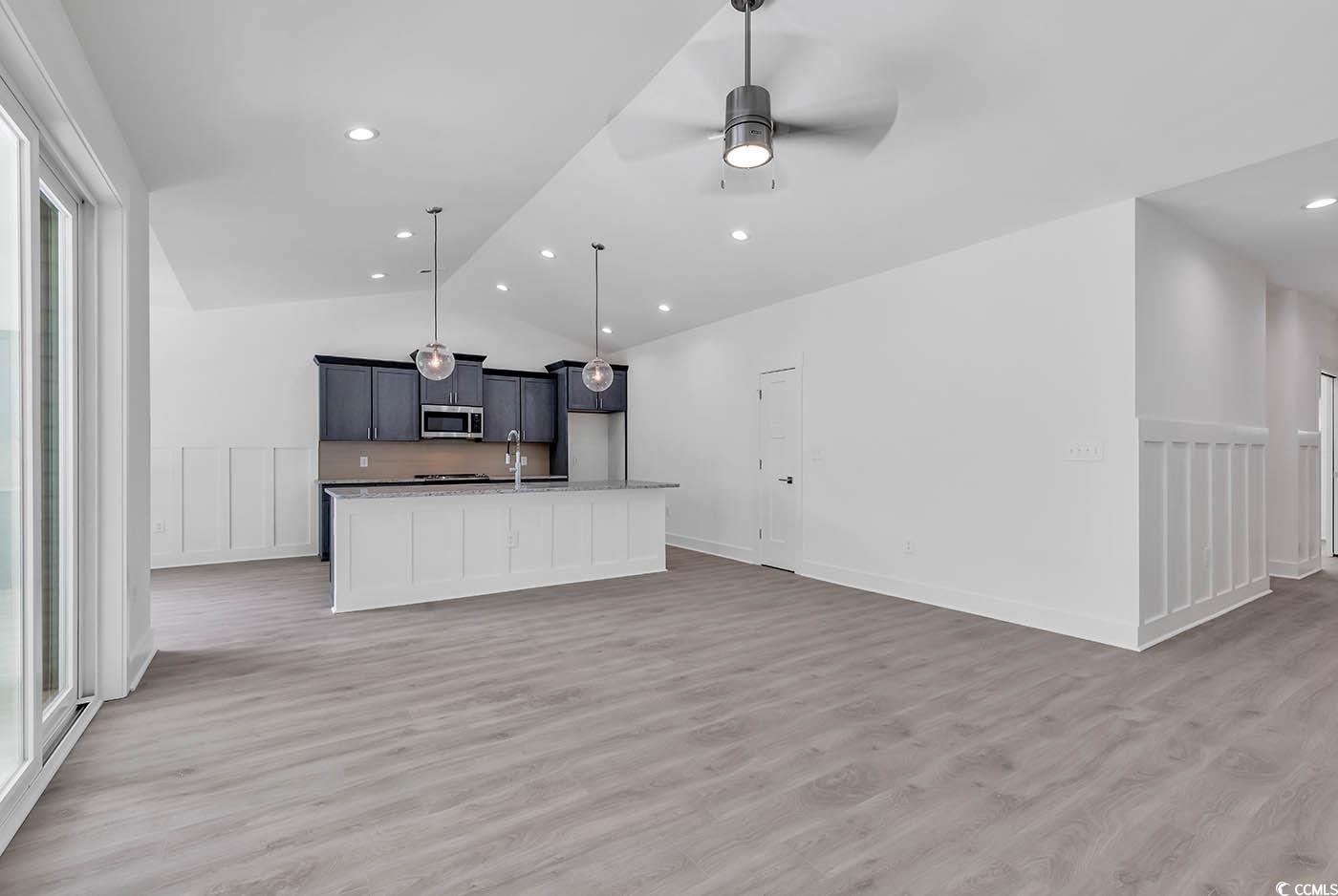 318 Dunbarton Lane Conway, SC 29526 - Photo 13 of 33 Living Room featuring light wood laminate flooring