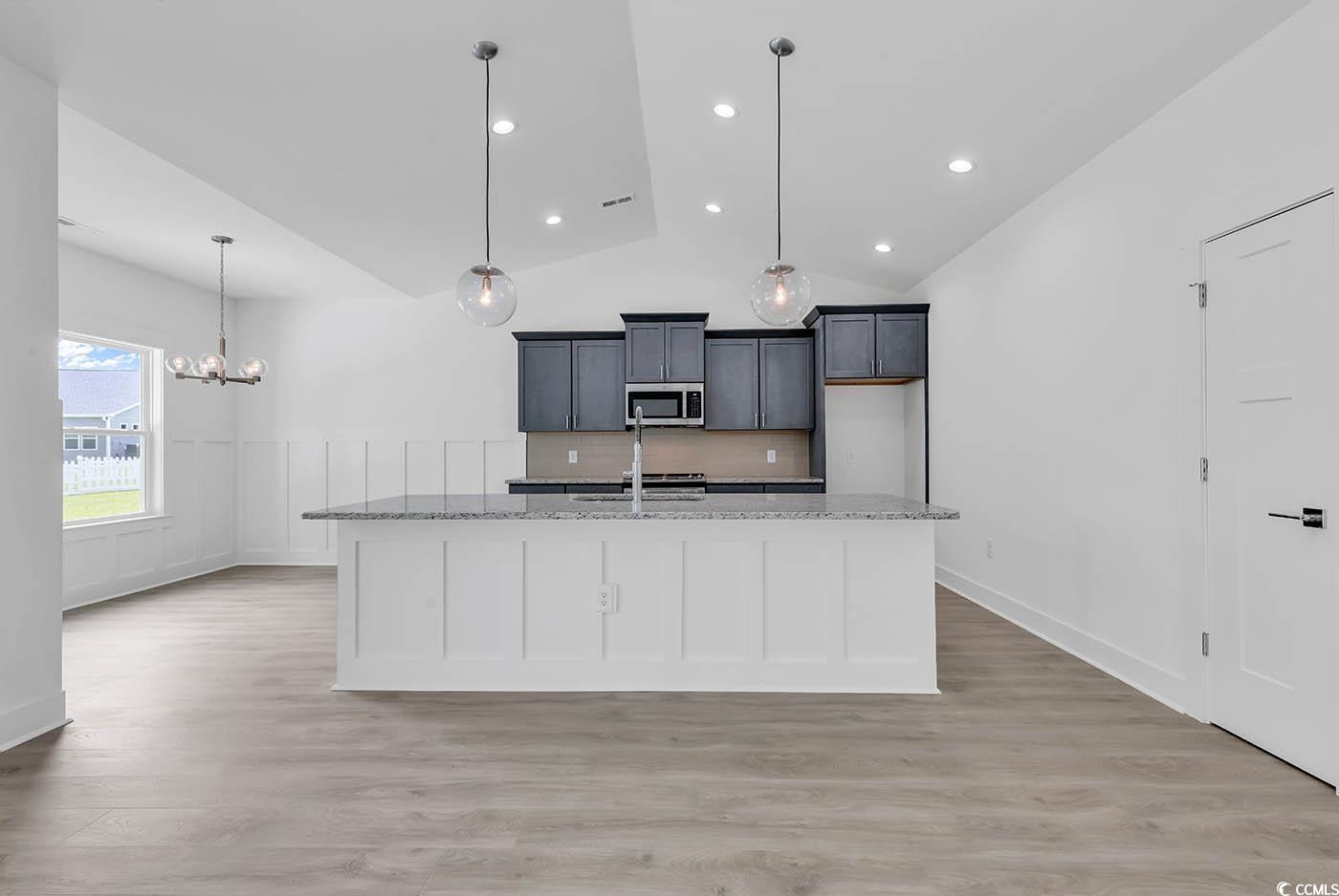 318 Dunbarton Lane Conway, SC 29526 - Photo 14 of 33 Kitchen with pendant lighting, decorative backspla