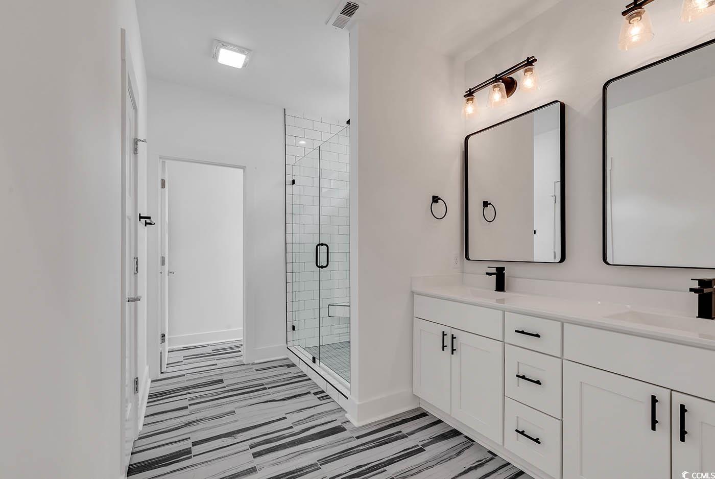 318 Dunbarton Lane Conway, SC 29526 - Photo 21 of 33 Master Bathroom with double sink vanity, walk-in t