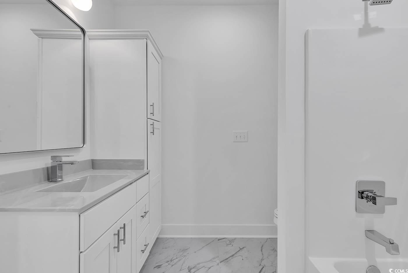 318 Dunbarton Lane Conway, SC 29526 - Photo 27 of 33 Full bathroom featuring tile flooring, bathing tub