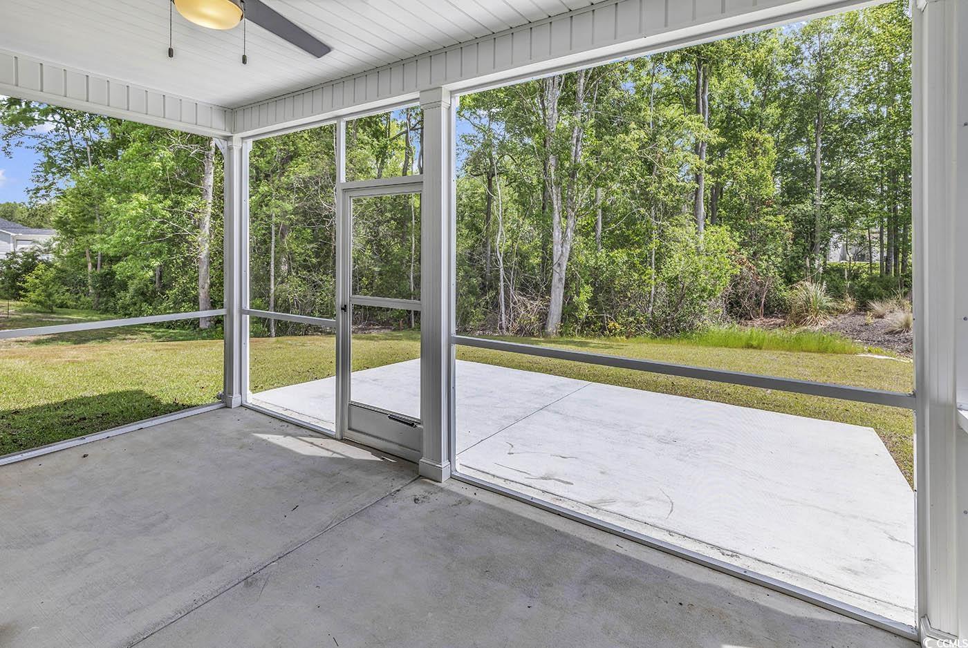 318 Dunbarton Lane Conway, SC 29526 - Photo 3 of 33 Covered Screened Porch with ceiling fan.