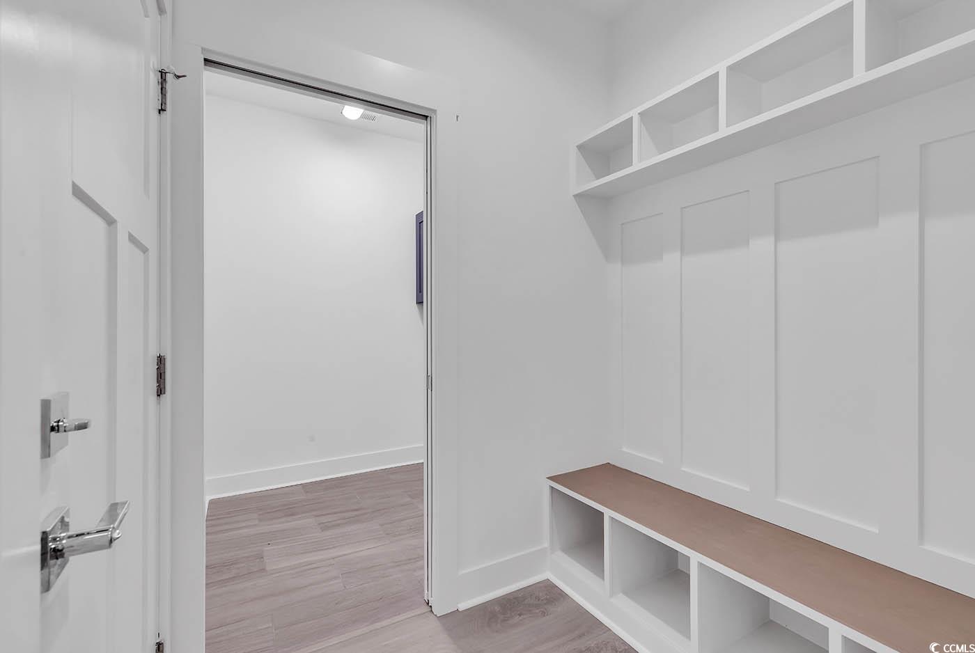 318 Dunbarton Lane Conway, SC 29526 - Photo 31 of 33 Mudroom with bench with cubbies, light wood lamina