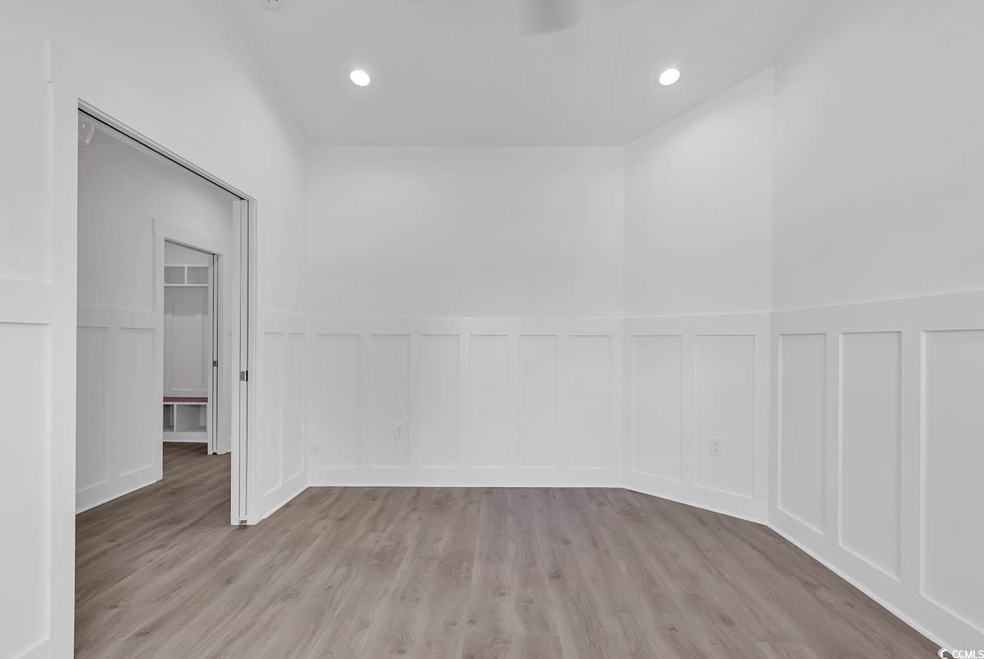 318 Dunbarton Lane Conway, SC 29526 - Photo 5 of 33 Flex room with light wood laminate flooring.