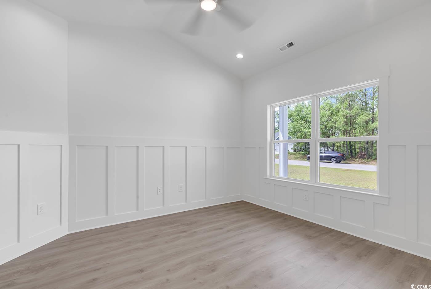 318 Dunbarton Lane Conway, SC 29526 - Photo 6 of 33 Flex room with light wood laminate flooring, ceili