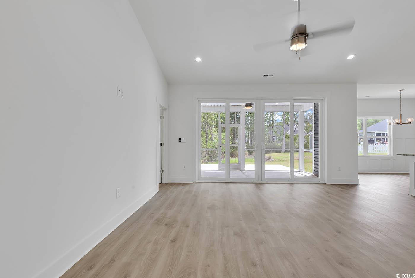 318 Dunbarton Lane Conway, SC 29526 - Photo 8 of 33 Living Room with light wood laminate flooring, a w