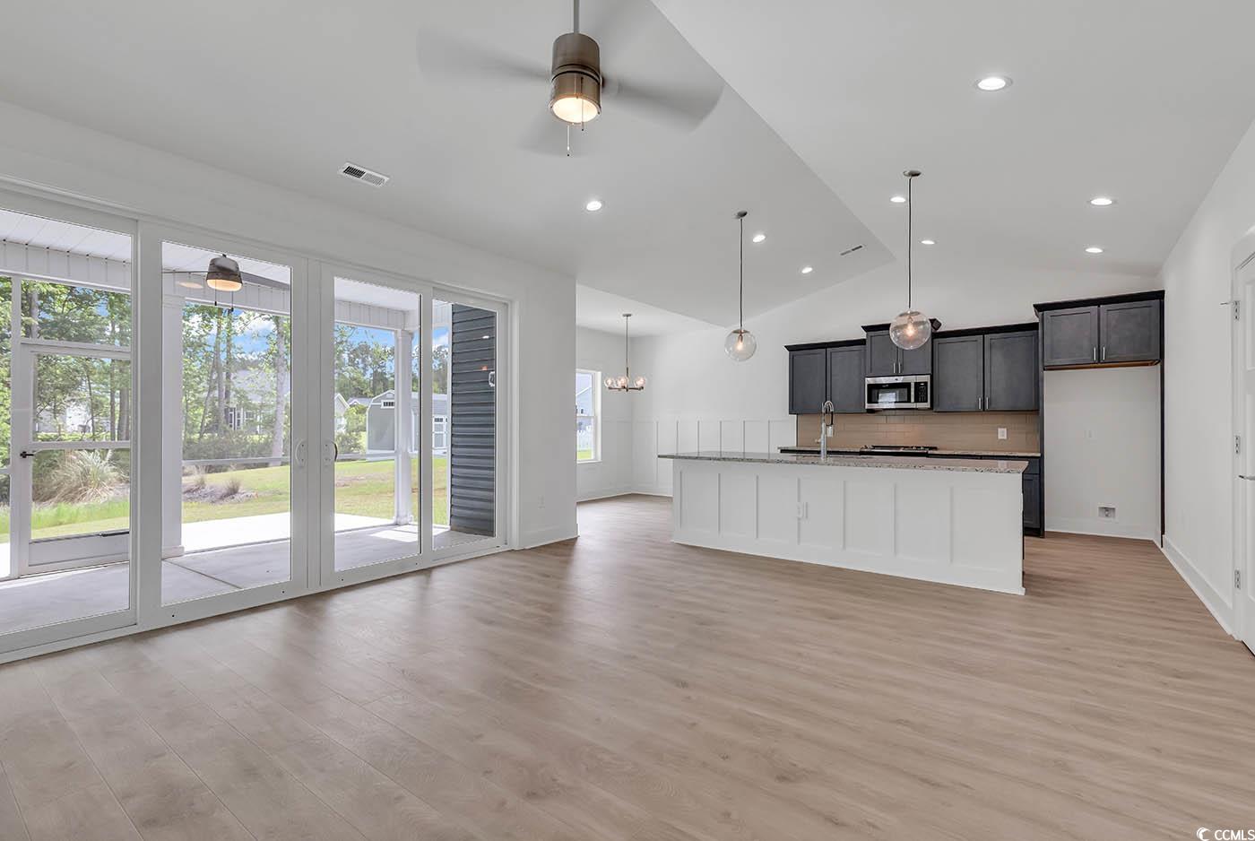 318 Dunbarton Lane Conway, SC 29526 - Photo 9 of 33 Living Room with view of Kitchen Island, light woo