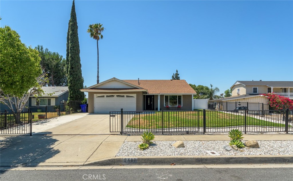 8407 East 9th Street Rancho Cucamonga, CA 91730 - Photo 1 of 1 a view of a house with a backyard and road