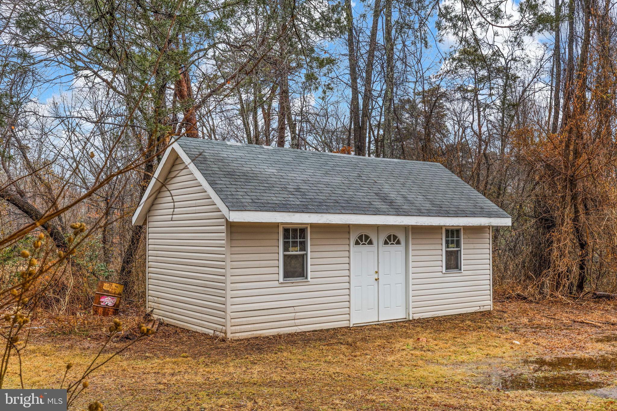 10789 Brent Town Road Catlett, VA 20119 - Photo 13 of 55 Charming cabin nestled among the trees.