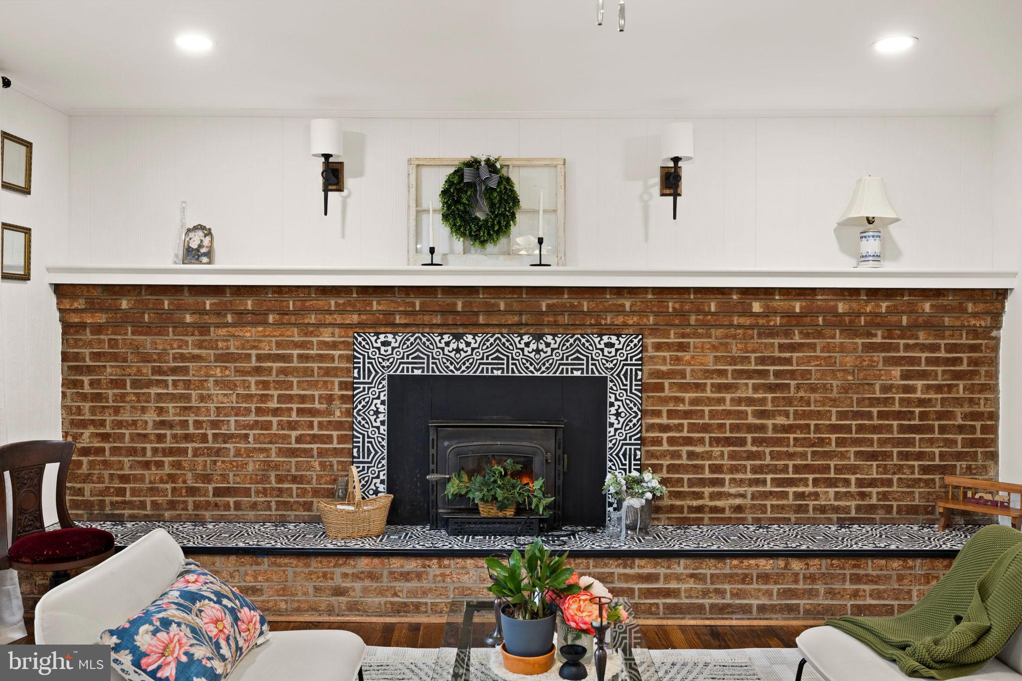 10789 Brent Town Road Catlett, VA 20119 - Photo 19 of 55 Charming brick fireplace with stylish accents.