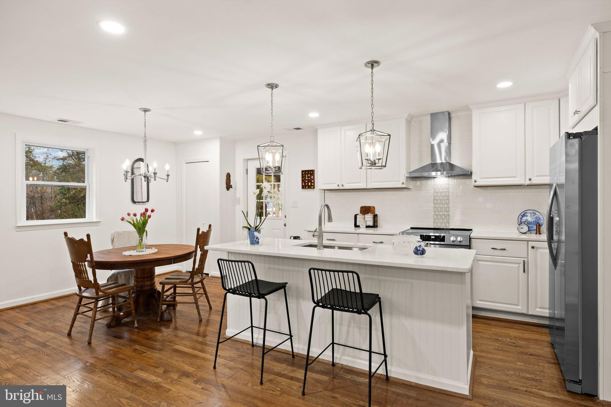 10789 Brent Town Road Catlett, VA 20119 - Photo 29 of 55 Modern kitchen with inviting dining area.