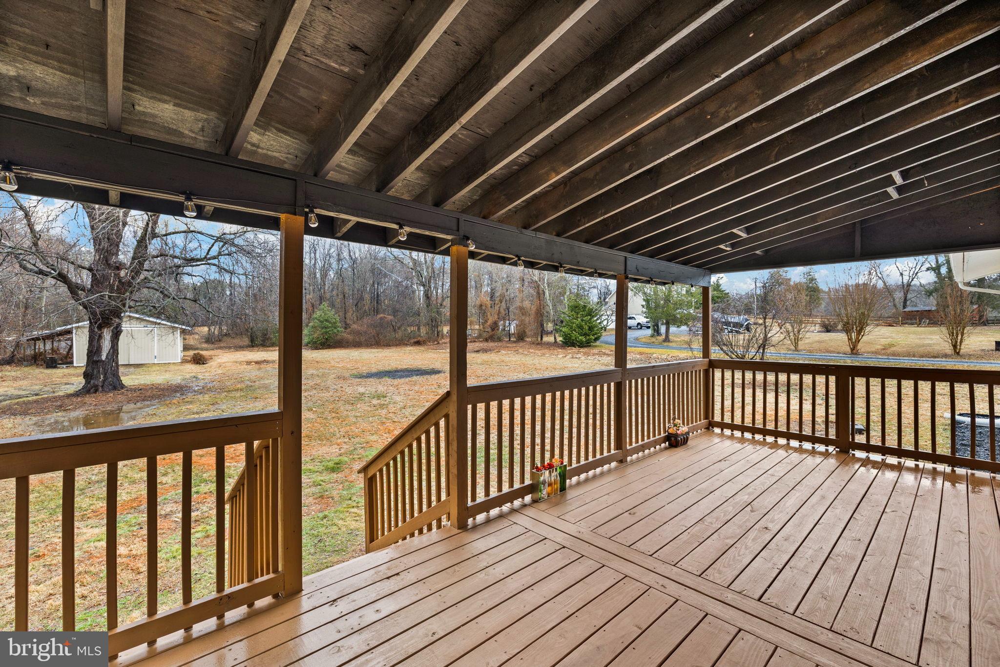 10789 Brent Town Road Catlett, VA 20119 - Photo 9 of 55 Spacious porch with serene outdoor views.