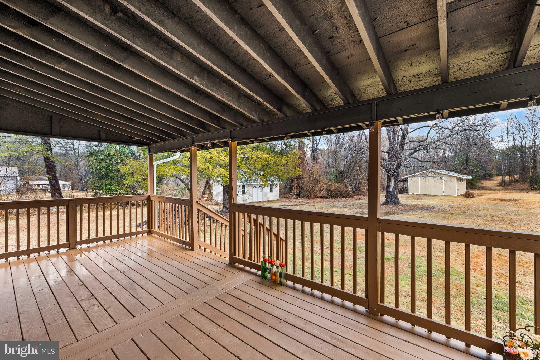 10789 Brent Town Road Catlett, VA 20119 - Photo 10 of 55 Spacious deck with serene outdoor views.