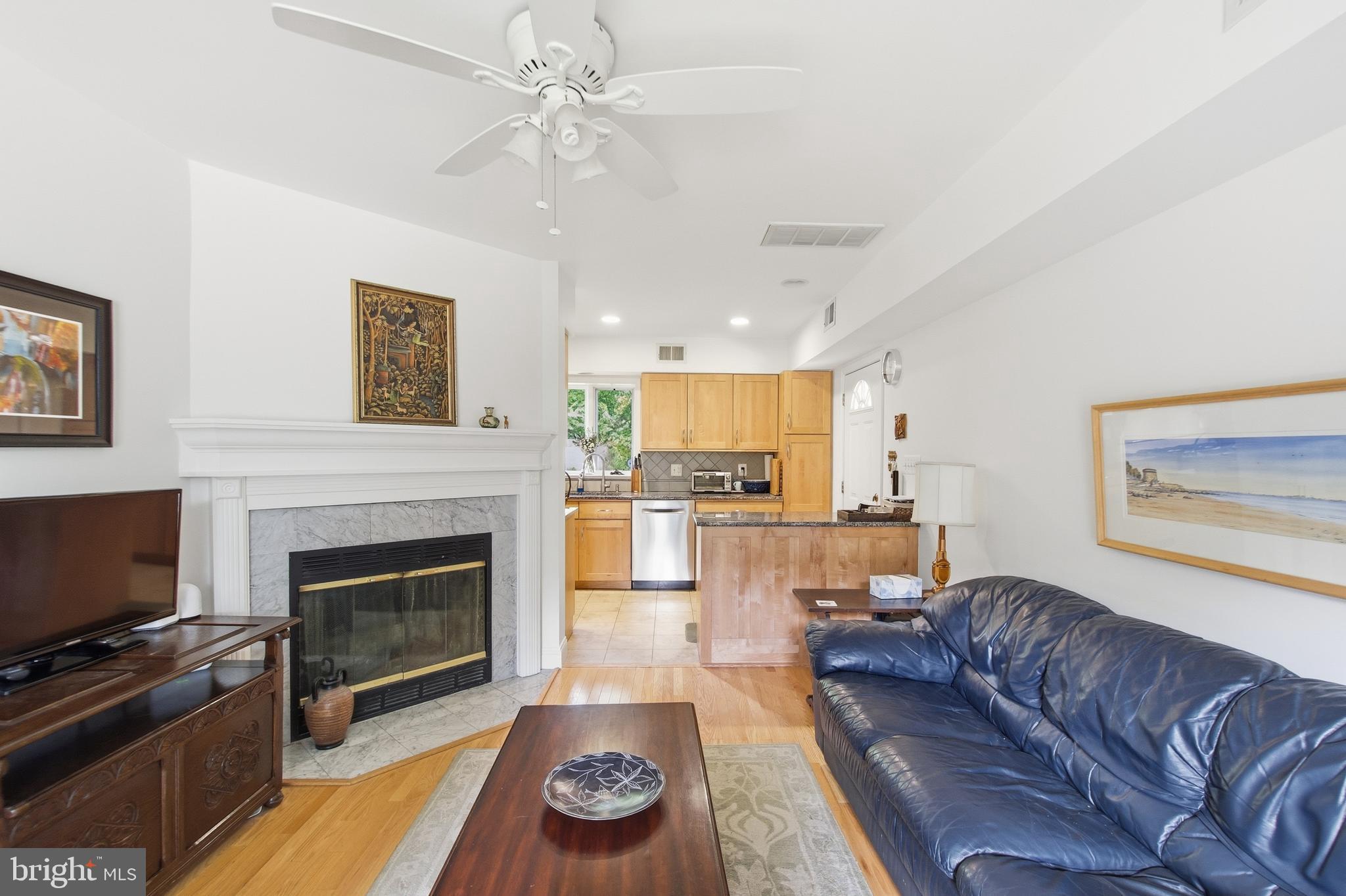 215 West George Mason Road Falls Church, VA 22046 - Photo 20 of 50 a living room with furniture and a fireplace