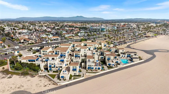 an aerial view of beach and ocean