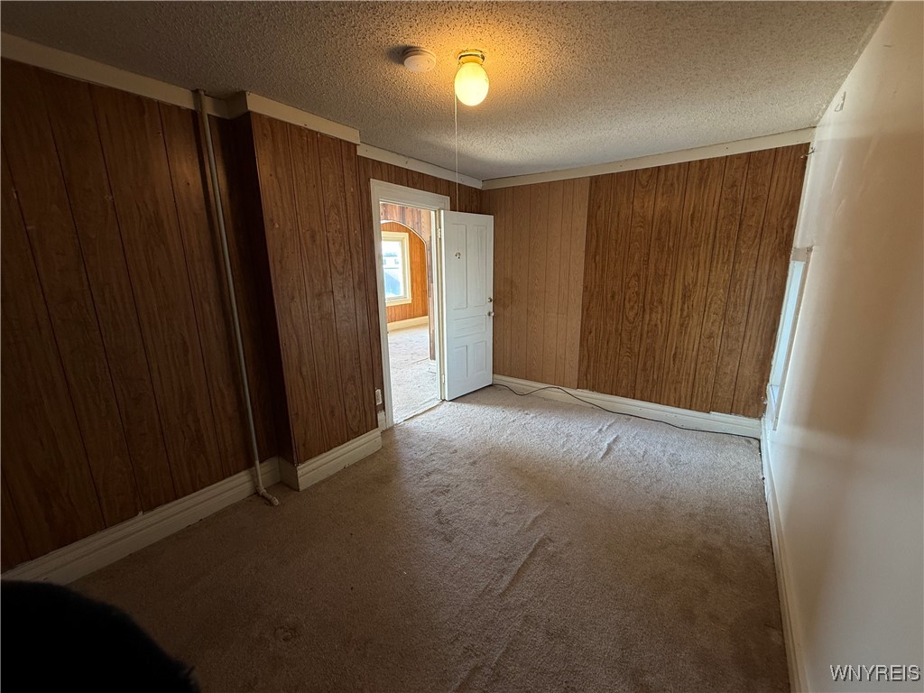 1816 Military Road Tonawanda, NY 14217 - Photo 11 of 15 Second bedroom with a view to the living room