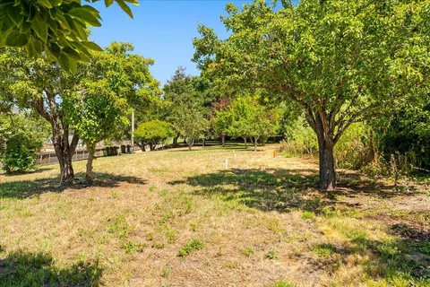 a view of yard covered with snow