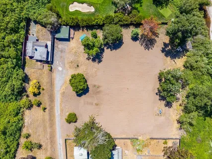 an aerial view of a house having yard