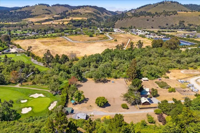 a view of a lake with mountains in the background