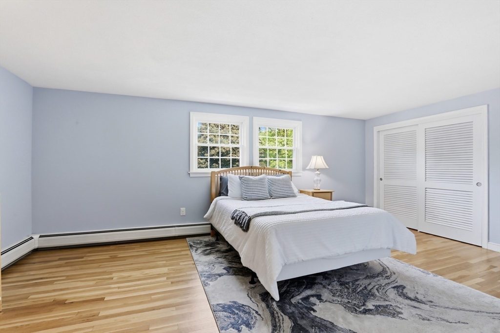 94 Johnson Road Winchester, MA 01890 - Photo 22 of 40 a bed room with a bed and a window