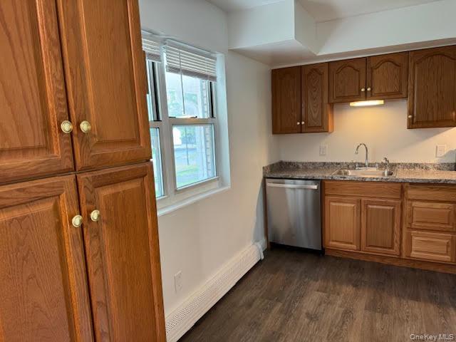 23 Brewster Road Cornwall, NY 12518 - Photo 5 of 39 Kitchen with pantry, large window, wood cabinets and stainless steel appliances.
