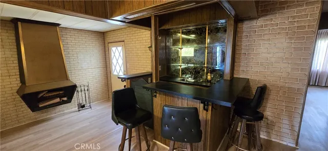 a room with furniture and wooden floor