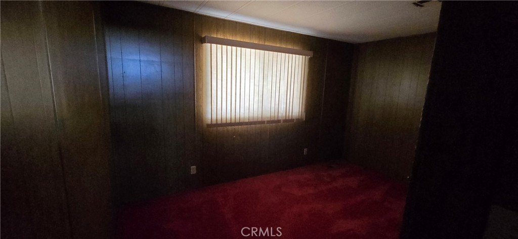 9391 California Avenue, Unit 80 Riverside, CA 92503 - Photo 16 of 28 a view of an empty room and window