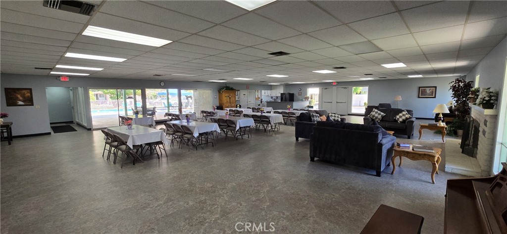 9391 California Avenue, Unit 80 Riverside, CA 92503 - Photo 27 of 28 a group of people sitting in a room