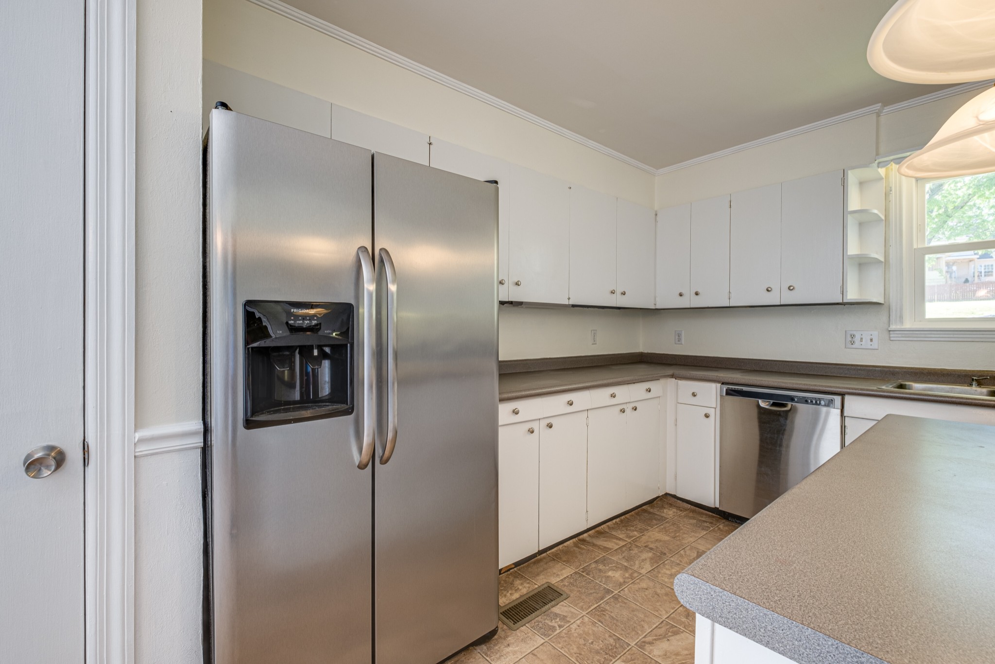 1349 Old Lebanon Dirt Road Mount Juliet, TN 37122 - Photo 13 of 38 a kitchen with stainless steel appliances granite countertop a refrigerator and a stove
